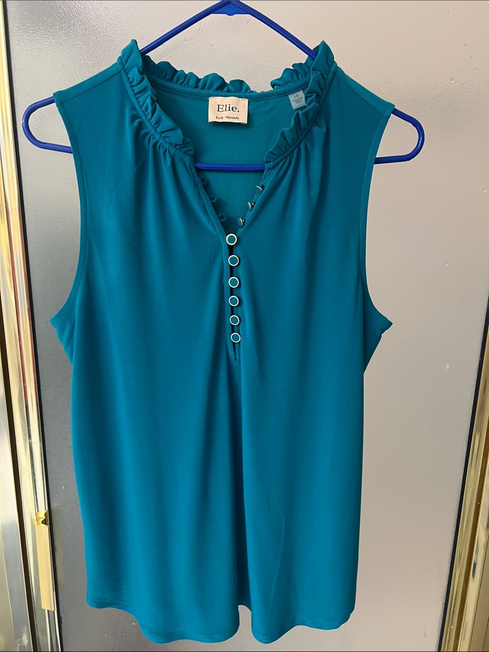 Ellie Teal Ruffled V-Neck Sleeveless Blouse - Picture 1 of 6